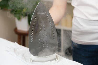 removing melted material from steam iron